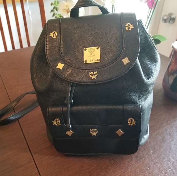 Authentic MCM Studded Black Leather Backpack in excellent used condition. - Picture 3 of 16